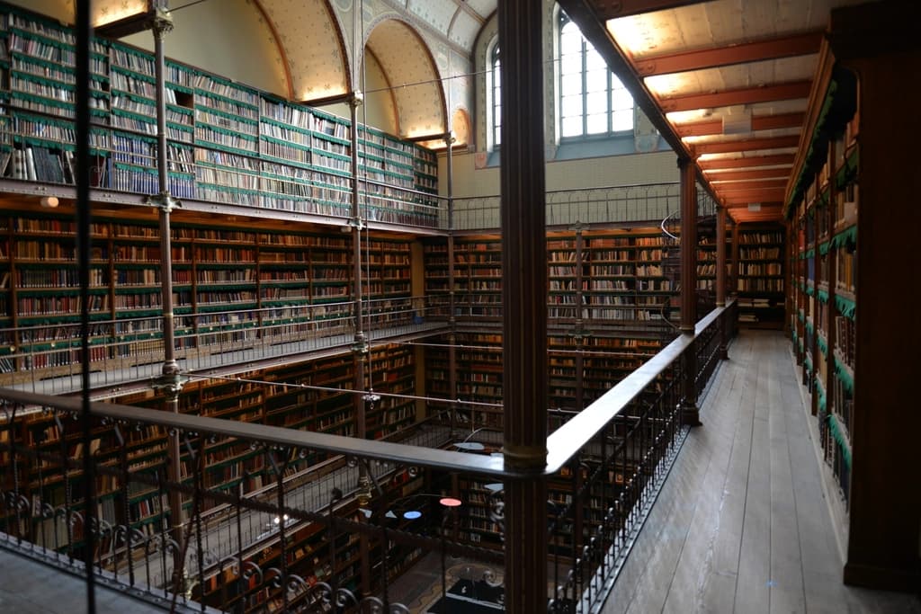The galleried bookshelves of a research library